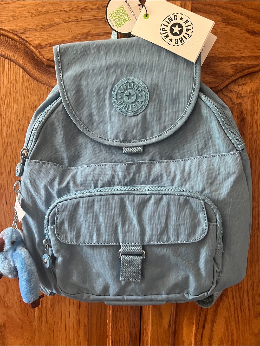 Kipling Dusty Blue Nylon Mini Backpack with monkey bag Charm